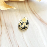 Large Pale Brown Teardrop Giraffe Turquoise Background