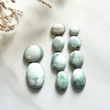 Small Faint Green Freeform Crescent Lake Variscite, Set of 10 Background