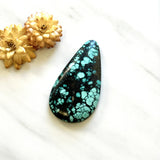 Large Faint Blue Teardrop Yungai Turquoise Background