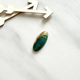 Large Deep Green Oval Royston Turquoise Background