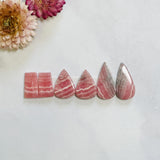 Medium Pink Mixed Rhodochrosite, Set of 6 Background