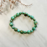 Sea Green Fox Turquoise Smooth Nugget Beads Background