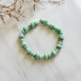 Mint Green Lucid Variscite Drum Beads Background