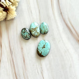 Small Sky Blue Oval Sand Hill Turquoise, Set of 4 Background