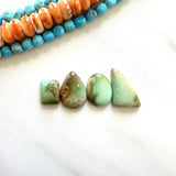 Small Faint Green Mixed Crescent Lake Variscite, Set of 4 Background