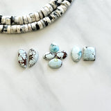 Small Faint Blue Mixed Sand Hill Turquoise, Set of 8 Background