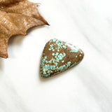 Large Faint Green Freeform Number 8 Turquoise Background