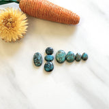 Small Ocean Blue Mixed Morenci Turquoise, Set of 8 Background