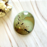 Large Faint Green Oval Treasure Mountain Turquoise Background