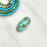 Large Sky Blue Oval Wild Horse Turquoise Background