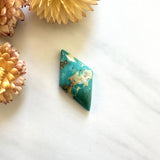 Large Sea Green Diamond Royston Turquoise Background