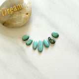 Small Faint Green Oval Kingman Turquoise, Set of 7 Background