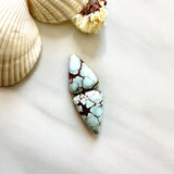 Small Faint Blue Teardrop Sand Hill Turquoise, Set of 2 Background