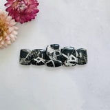 Small Black Barrel White Buffalo Dolomite, Set of 5 Background