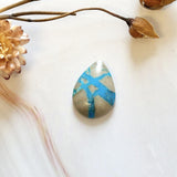 Large Ocean Blue Teardrop Ithaca Peak Turquoise Background