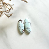 Small Faint Blue Oval Sand Hill Turquoise, Set of 2 Background