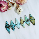 Large Mixed Triangle Mixed Turquoise, Set of 12 Background