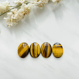 Medium Earth Brown Oval Tiger Eye Crystal, Set of 4 Background