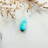 Large Sky Blue Teardrop Sleeping Beauty Turquoise Background