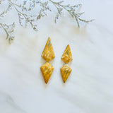 Large Royal Orange Shield Golden Birch Turquoise, Set of 4 Background
