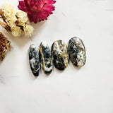 Large Black Surfboard White Buffalo Dolomite, Set of 4 Background