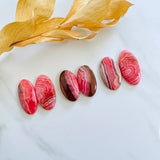 Large Pink Oval Rhodochrosite, Set of 6 Background