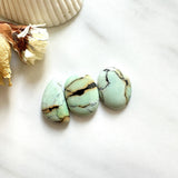 Small Faint Green Mixed Crescent Lake Variscite, Set of 3 Background