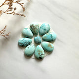 Small Faint Blue Mixed Lone Mountain Turquoise, Set of 9 Background