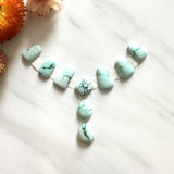 Small Faint Blue Mixed Sand Hill Turquoise, Set of 9 Background