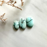 Small Faint Blue Oval Sand Hill Turquoise, Set of 3 Background