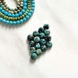 Small Ocean Blue Round Yungai Turquoise, Set of 16 Background