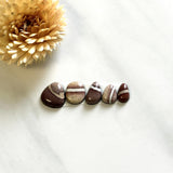 Small Red Mixed White Buffalo Dolomite, Set of 5 Background