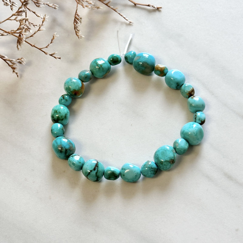 Small Sky Blue Nugget Beads Fox Turquoise Background