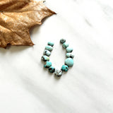 Small Faint Blue Mixed Lone Mountain Turquoise, Set of 13 Background