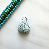 Large Faint Blue Teardrop Sand Hill Turquoise Background