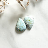 Small Faint Blue Teardrop Sand Hill Turquoise, Set of 2 Background