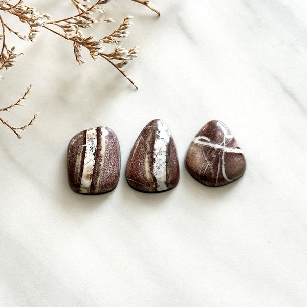 Large Red Mixed White Buffalo Dolomite, Set of 3 Background