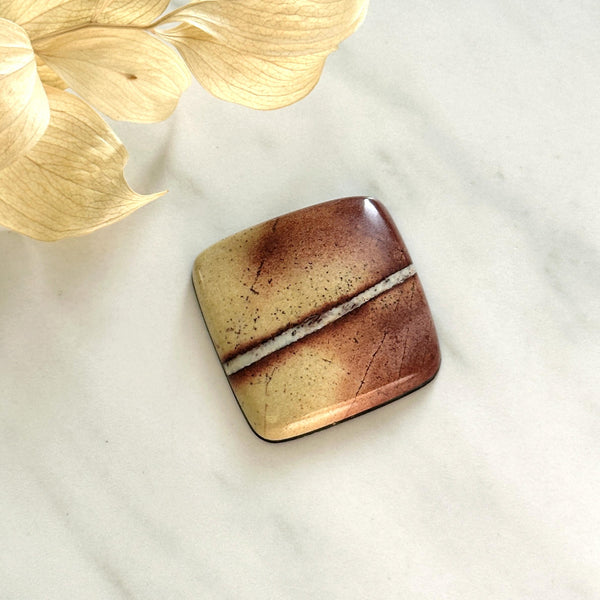 Large Red Cushion White Buffalo Dolomite Background