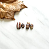 Small Red Oval White Buffalo Dolomite, Set of 4 Background