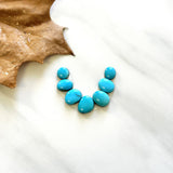 Small Sky Blue Oval Sleeping Beauty Turquoise, Set of 7 Background