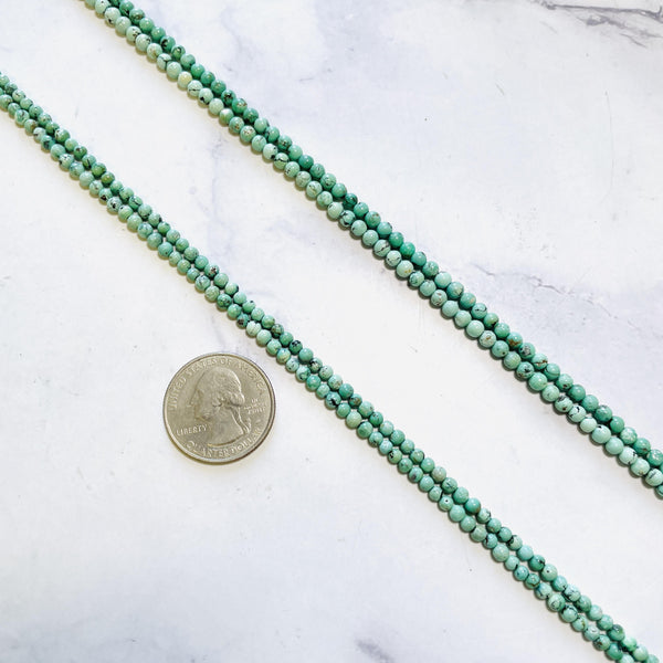 Faint Green Treasure Mountain Turquoise Round Beads