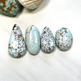 Large Faint Blue Mixed Sand Hill Turquoise, Set of 4 Background