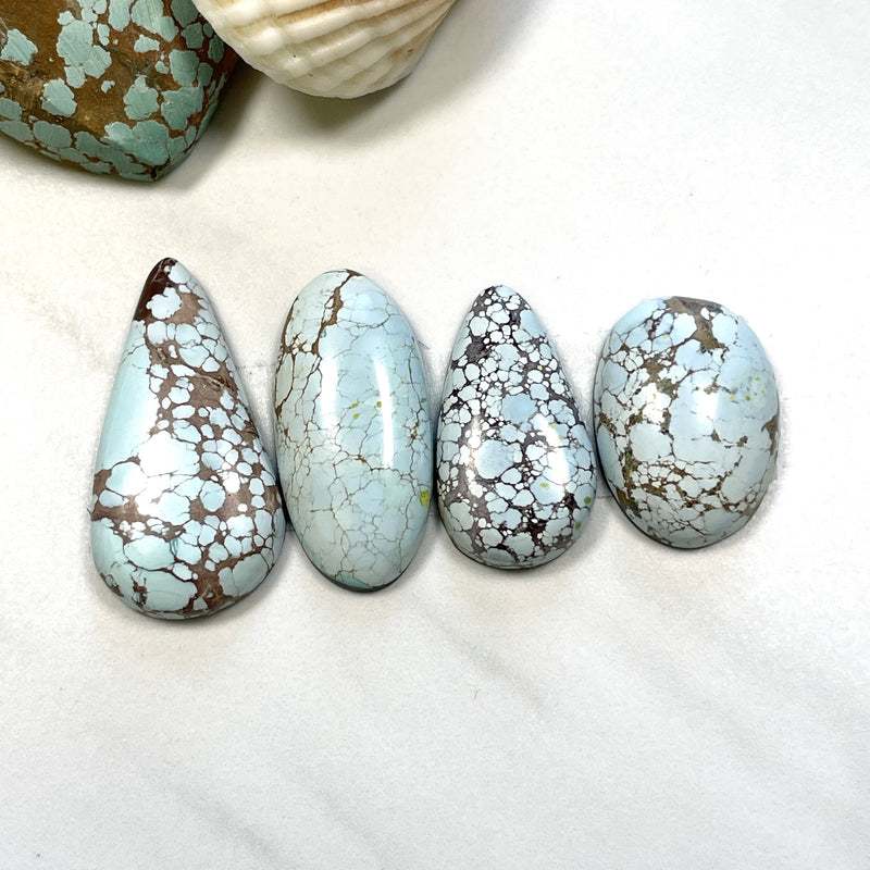 Large Faint Blue Mixed Sand Hill Turquoise, Set of 4 Background