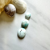 Small Faint Blue Oval Sand Hill Turquoise, Set of 3 Background