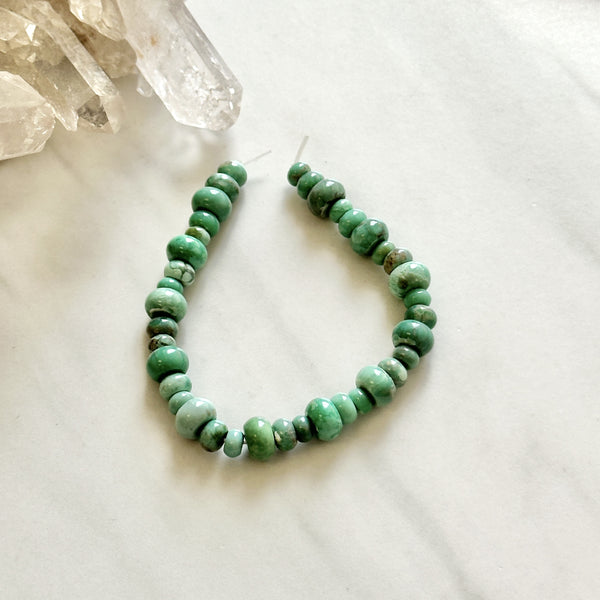 Sea Green Lucid Variscite Drum Beads Background