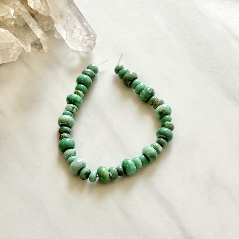 Sea Green Lucid Variscite Drum Beads Background