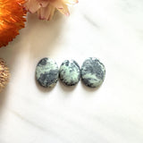 Small Faint Green Freeform Crescent Lake Variscite, Set of 3 Background