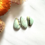 Small Faint Blue Freeform Crescent Lake Variscite, Set of 3 Background