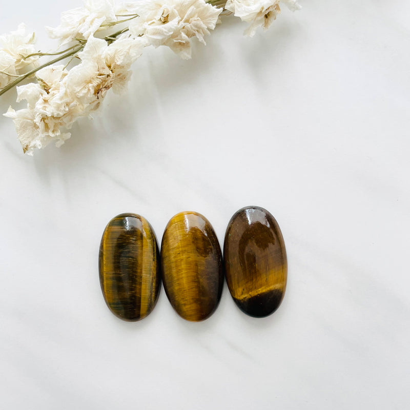 Large Earth Brown Oval Tiger Eye Crystal, Set of 3 Background