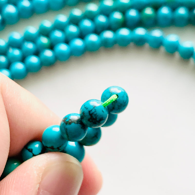 Small Ocean Blue Round Yungai Beads, Set of 6 Background